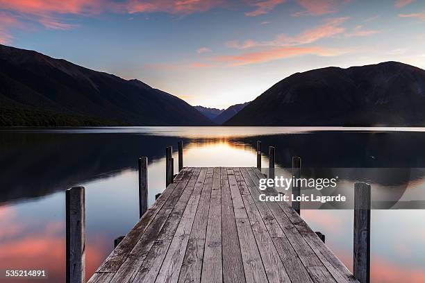 lake rotoroa at dusk in nelson lakes national park - nelson lakes national park stock pictures, royalty-free photos & images
