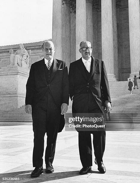 Thurgood Marshall , Solicitor General, leaves the US Supreme Court Building with Attorney General Nicholas Katzenbach, Washington DC, 1965.
