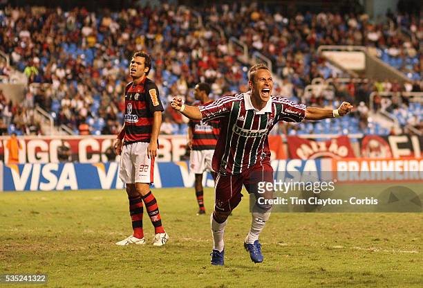 Fluminense striker Rodriguinho celebrates after scoring his sides third goal during the Flamengo V Fluminense, Futebol Brasileirao League match at...