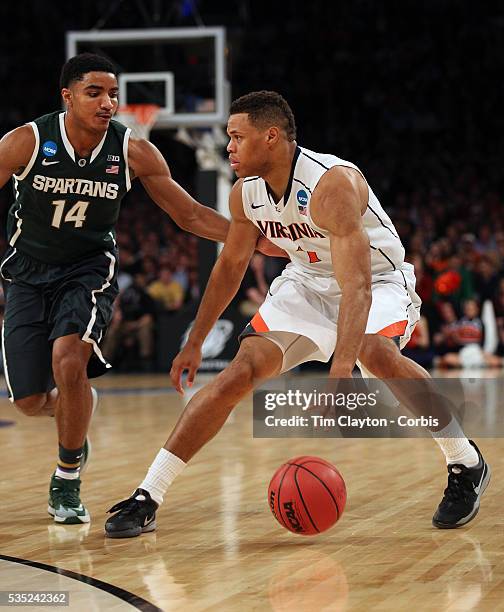 Justin Anderson, Virginia, in action during the Virginia Cavaliers Vs Michigan State Spartans basketball game during the 2014 NCAA Division 1 Men's...