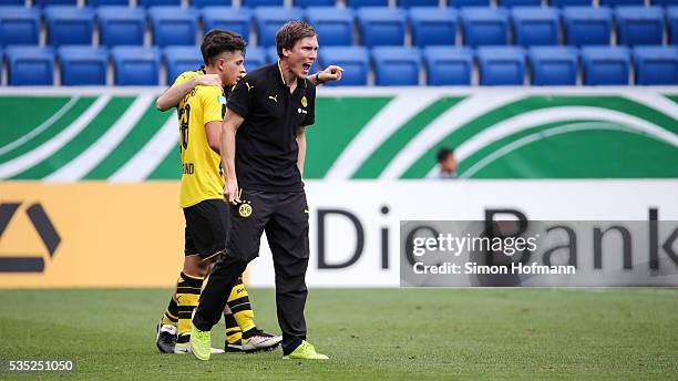 Head coach Hannes Wolf of Dortmund celebrates his team's fifth goal during the A Juniors German Championship Final match between 1899 Hoffenheim U19...