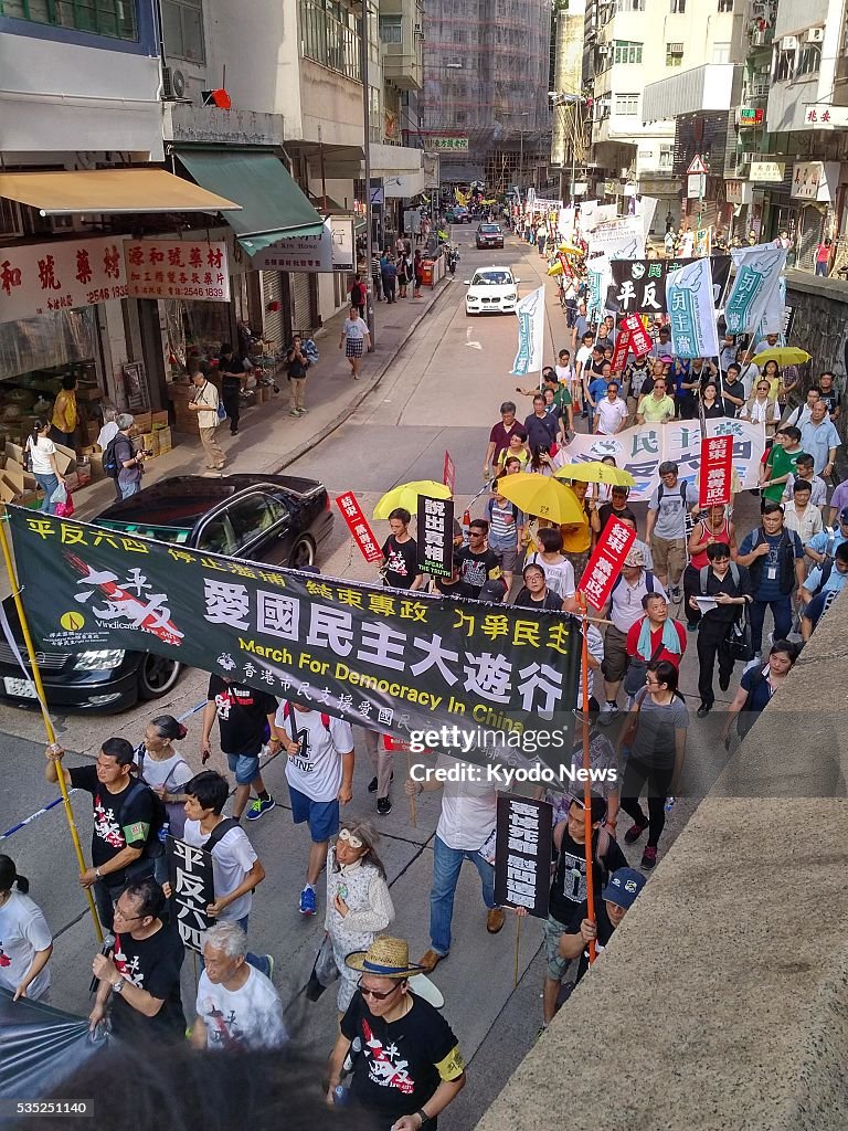Hundreds march in H.K. ahead of Tiananmen Square anniversary