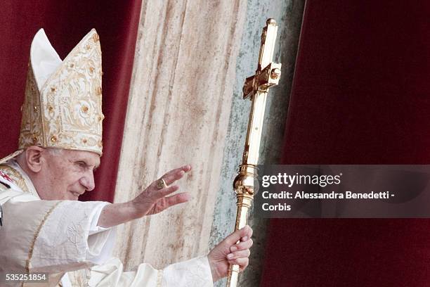 Pope Benedict XVI delivers his Easter Day message 'urbi et orbi' blessing from the central balcony of St Peter's Basilica.