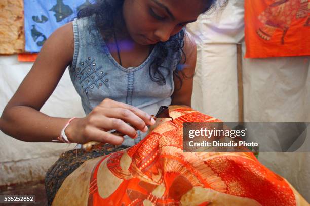 traditional batik cloth being made in kandy, sri lanka. - sri lankan culture stock pictures, royalty-free photos & images