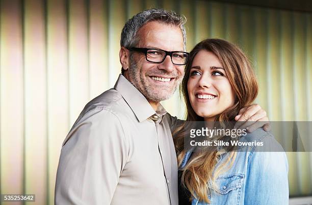 portrait of a father and his young adult daughter - 55 59 anni foto e immagini stock