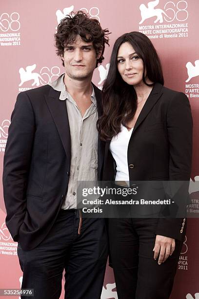 Monica Bellucci and Louis Garrel attend the photocall of movie "Un Ete' Brulant " presented in competition at the 68th Venice International Film...