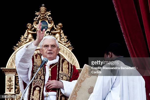 Pope Benedict XVI delivers the "Urbi et Orbi" message from the center Loggia of St. Peter's Basilica at the Vatican. Questions regarding the...