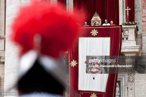 Pope Benedict XVI delivers the "Urbi et Orbi" message from the center Loggia of St. Peter's Basilica at the Vatican. Questions regarding the...