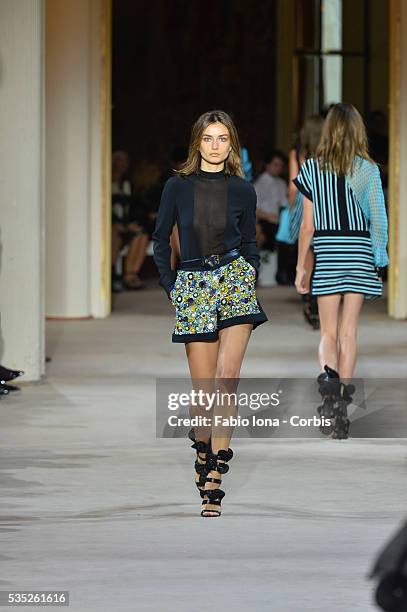 Model walks the runway during the Emanuel Ungaro fashion show at Paris Fashion Week Womenswear Spring/Summer 2014 on Septemner 30, 2013 in Paris,...