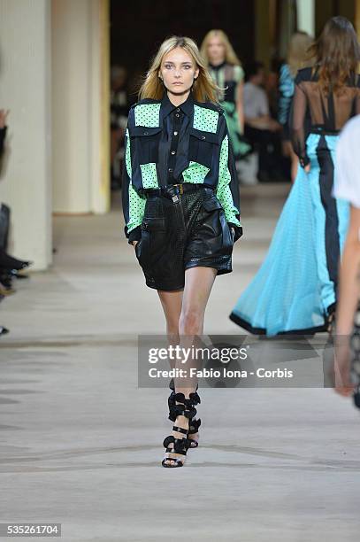 Model walks the runway during the Emanuel Ungaro fashion show at Paris Fashion Week Womenswear Spring/Summer 2014 on Septemner 30, 2013 in Paris,...