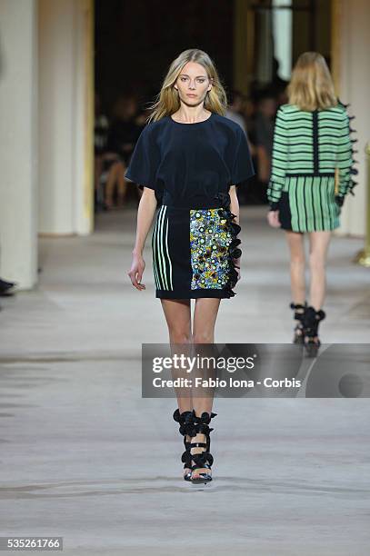 Model walks the runway during the Emanuel Ungaro fashion show at Paris Fashion Week Womenswear Spring/Summer 2014 on Septemner 30, 2013 in Paris,...