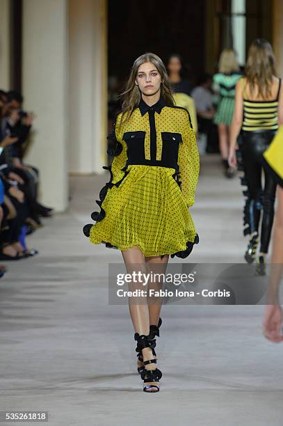 Model walks the runway during the Emanuel Ungaro fashion show at Paris Fashion Week Womenswear Spring/Summer 2014 on Septemner 30, 2013 in Paris,...