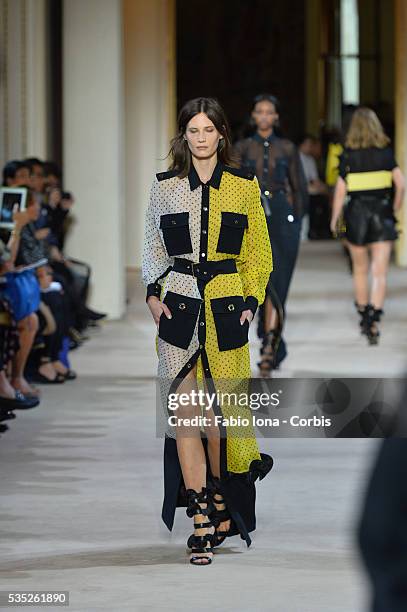 Model walks the runway during the Emanuel Ungaro fashion show at Paris Fashion Week Womenswear Spring/Summer 2014 on Septemner 30, 2013 in Paris,...