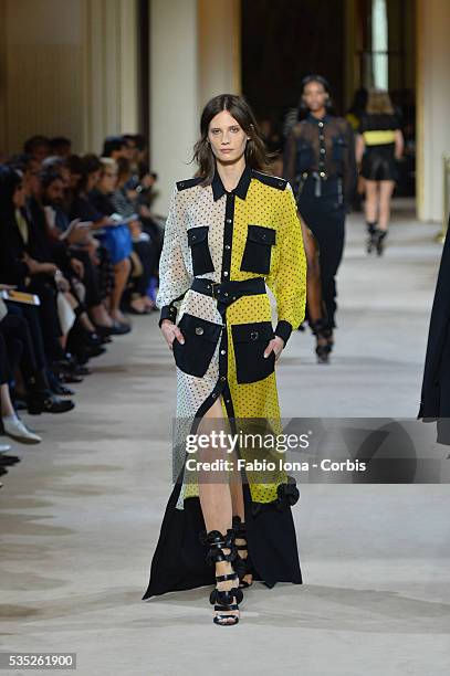 Model walks the runway during the Emanuel Ungaro fashion show at Paris Fashion Week Womenswear Spring/Summer 2014 on Septemner 30, 2013 in Paris,...