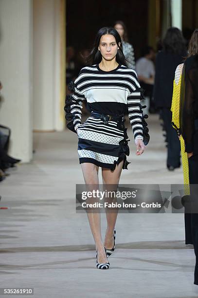 Model walks the runway during the Emanuel Ungaro fashion show at Paris Fashion Week Womenswear Spring/Summer 2014 on Septemner 30, 2013 in Paris,...