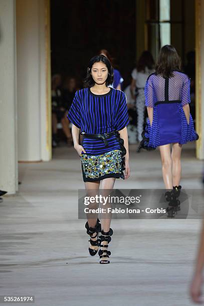 Model walks the runway during the Emanuel Ungaro fashion show at Paris Fashion Week Womenswear Spring/Summer 2014 on Septemner 30, 2013 in Paris,...