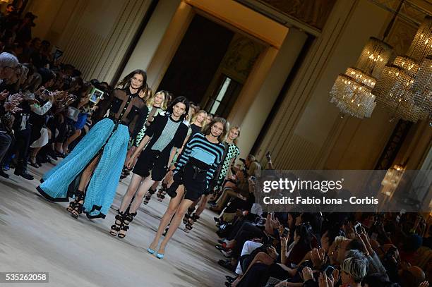 Model walks the runway during the Emanuel Ungaro fashion show at Paris Fashion Week Womenswear Spring/Summer 2014 on Septemner 30, 2013 in Paris,...