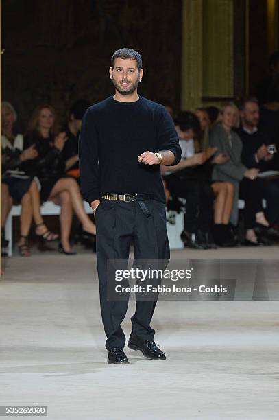 Designer Fausto Puglisi walks the runway during the Emanuel Ungaro fashion show at Paris Fashion Week Womenswear Spring/Summer 2014 on Septemner 30,...