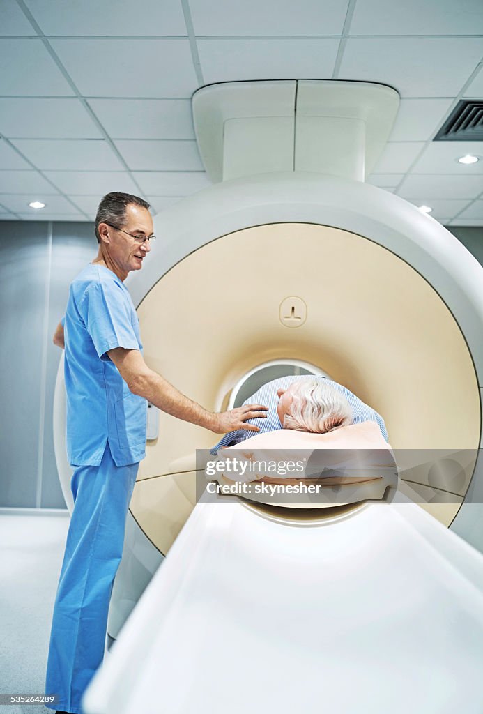 Radiologist consoling a patient.