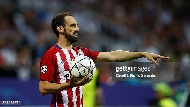 Juanfran of Atletico Madrid takes the throw-in during the Champions League final match between Real Madrid and Club Atletico de Madrid at Stadio...