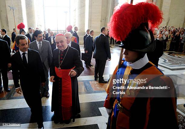French President Nicolas Sarkozy visits St. Peter's Basilica at the end of his meeting with Pope Benedict XVI on October 8, 2010 in Vatican City,...