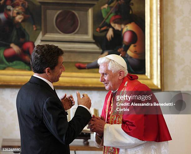 Pope Benedict XVI receives French president Nicolas Sarkozy at the Vatican.Photo by Vatican Pool.