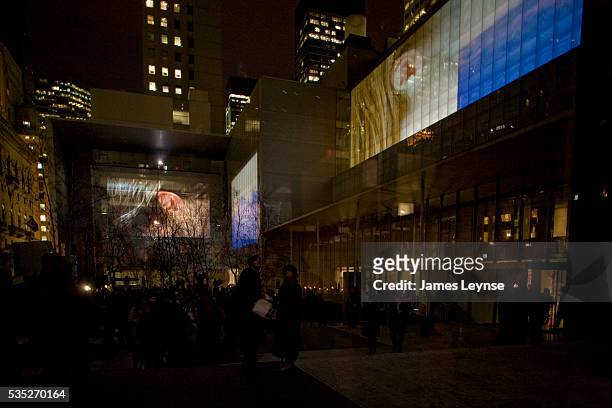 Opening night launch of Doug Aitkens "Sleepwalkers," a video installation projected onto the facades of the Museum of Modern Art. The exhibit, free...