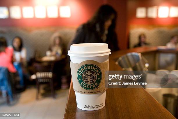 Coffee cup on a counter at a Starbucks coffee shop on the Upper West Side of Manhattan. Starbucks was offering free coffee to its New York customers...