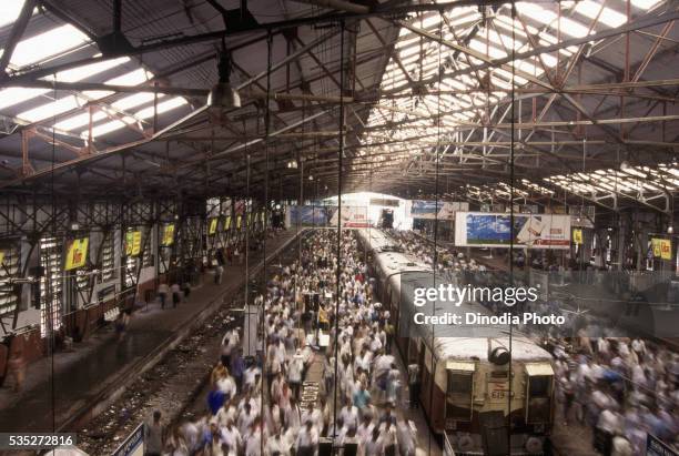 rush hour at a train station in bombay, india. - mumbai train stock pictures, royalty-free photos & images