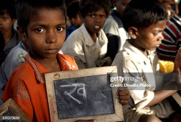 rural children studying at school in rajouli, nawada, bihar, india. - bihar stock pictures, royalty-free photos & images