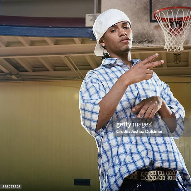 young man making hand gestures - anti bullying stockfoto's en -beelden