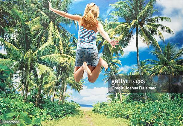 girl jumping - joshua dalsimer stock pictures, royalty-free photos & images