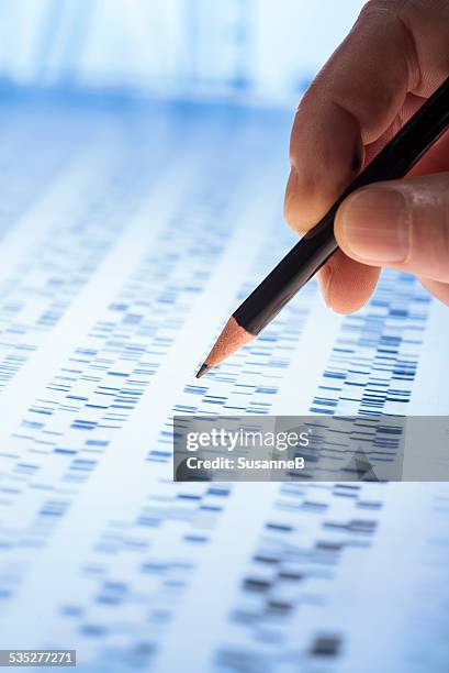 interpreting dna gel - criminology stock pictures, royalty-free photos & images