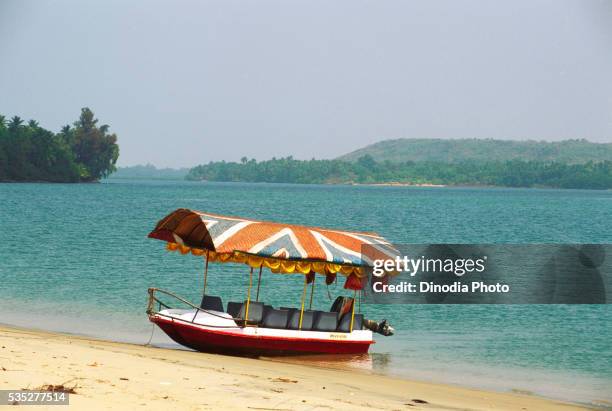 boat cruise in tarkarli, malvan, maharashtra, india. - maharashtra stock pictures, royalty-free photos & images