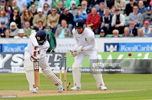 Lahiru Thirimanne of Sri Lanka is clean bowled by Moeen Ali during day three of the 2nd Investec Test match between England and Sri Lanka at Emirates...