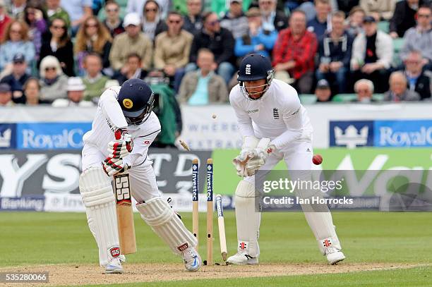 Lahiru Thirimanne of Sri Lanka is clean bowled by Moeen Ali during day three of the 2nd Investec Test match between England and Sri Lanka at Emirates...