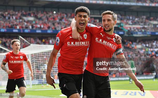 Ashley Fletcher of Barnsley FC celebrates scoring the first goal during the Sky Bet League One Play Off Final between Barnsley and Millwall at...