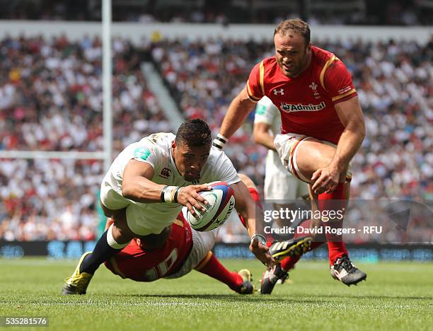 Luther Burrell of England dives over for their first try during the England v Wales International match at Twickenham Stadium on May 29, 2016 in...