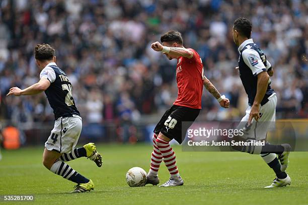 Adam Hammill of Barnsley FC scores the 2nd goal during the Sky Bet League One Play Off Final between Barnsley and Millwall at Wembley Stadium on May...
