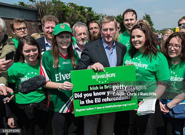 Prime Minister of Ireland Enda Kenny poses with Irish4Europe campaigners and speaks to the media at the London v Mayo Gaelic football game on May 28,...