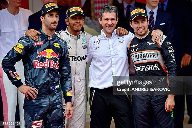 Infiniti Red Bull Racing's Australian driver Daniel Ricciardo, Mercedes AMG Petronas F1 Team's British driver Lewis Hamilton and Sahara Force India...