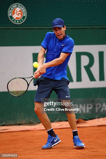 Yshai Oliel of Israel hits a forehand during the Boys Singles first round match against Kenneth Raisma of Estonia on day eight of the 2016 French...