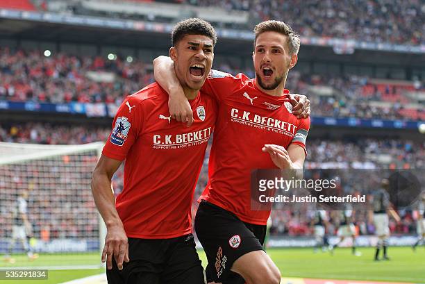 Ashley Fletcher of Barnsley FC celebrates scoring the first goal during the Sky Bet League One Play Off Final between Barnsley and Millwall at...