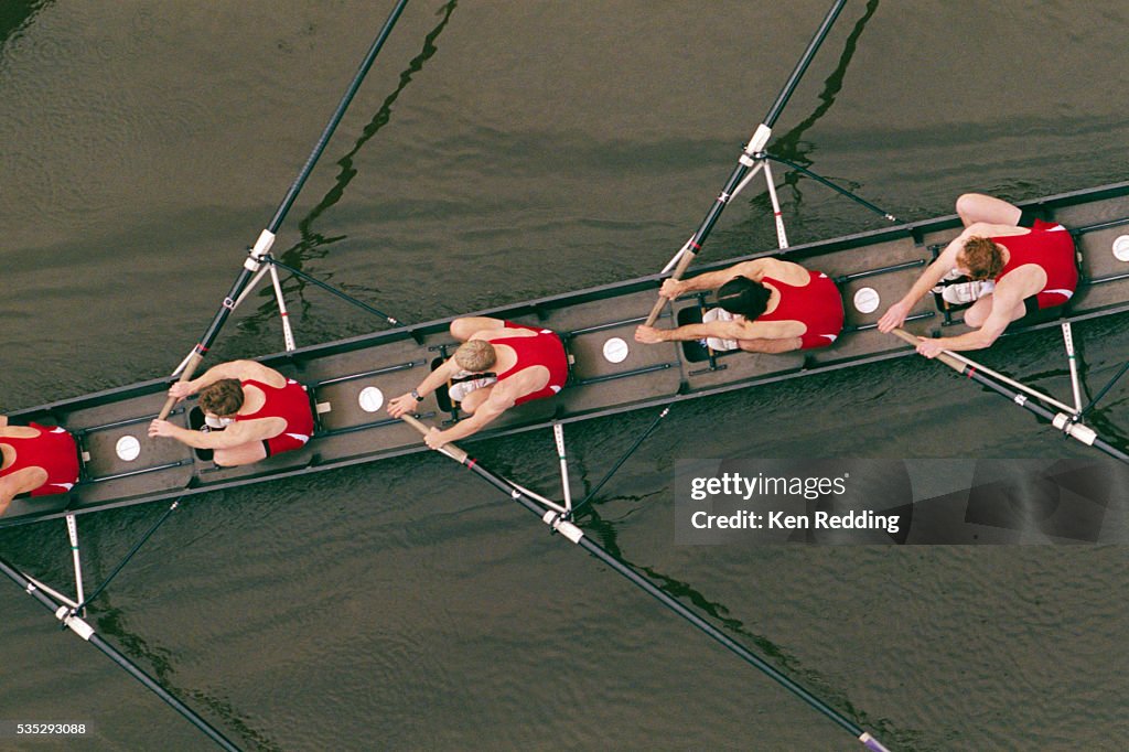 Crew Members Rowing