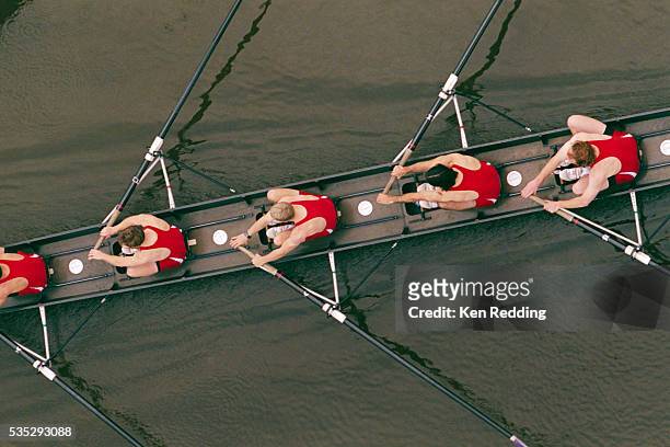 crew members rowing - 手漕ぎ船 ストックフォトと画像