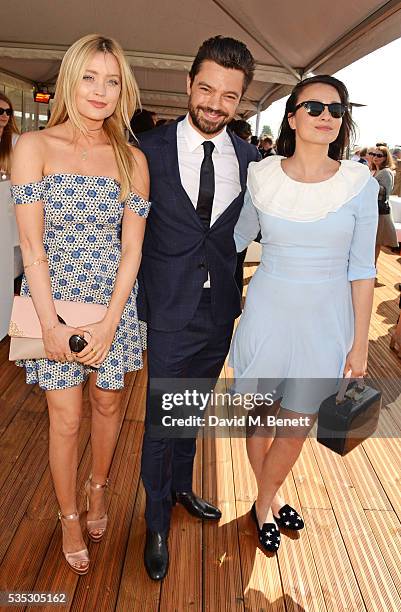 Laura Whitmore, Dominic Cooper and Gizzi Erskine attend day two of the Audi Polo Challenge at Coworth Park on May 29, 2016 in London, England.