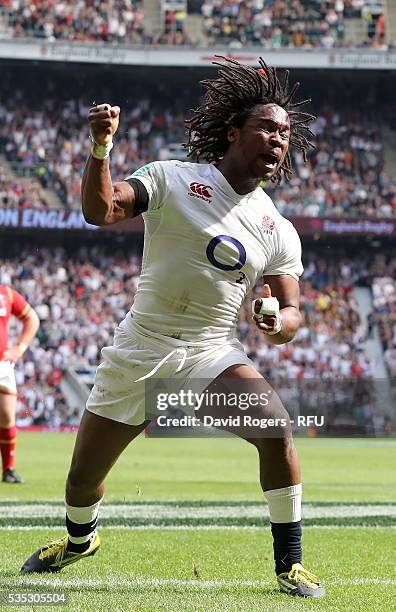 Marland Yarde of England celebrates after scoring their fifth try during the England v Wales International match at Twickenham Stadium on May 29,...