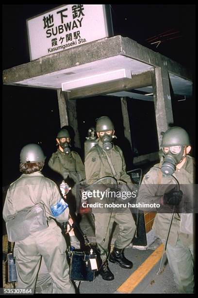 Soldiers prepare to clean out Kasumigaseki subway station after an attack using sarin gas. The attack, by the religious group Aum Shinrikyo, took...