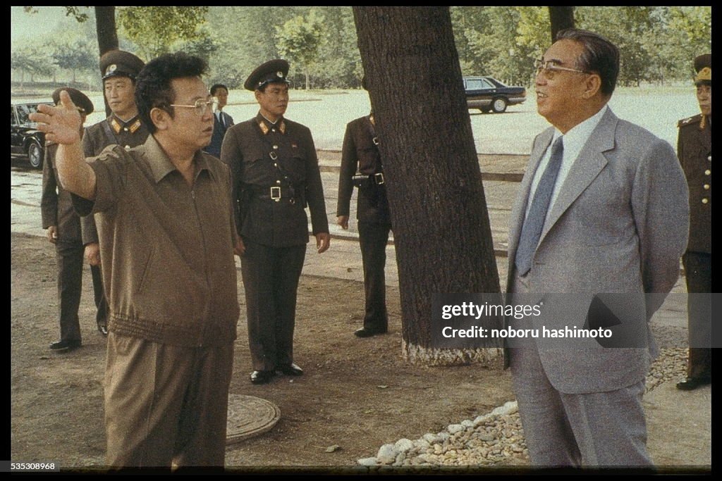 Kim Jong-il with his father Kim Il-sung