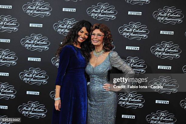 Afef Jenin and Sophia Loren attend the Pirelli Calendar 50th Anniversary event on November 21, 2013 in Milan, Italy